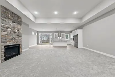 Living room and kitchen open floor plan - custom home in Tallmadge Ohio