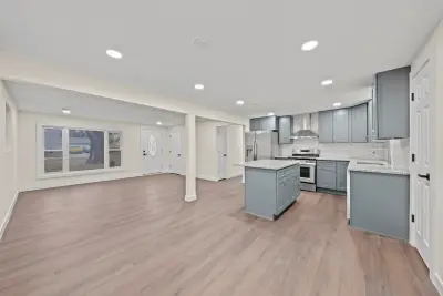 Dining, kitchen, and living open floor plan - custom home in Twinsburg Ohio