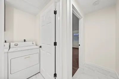 Hallway and laundry area - custom home in Twinsburg Ohio